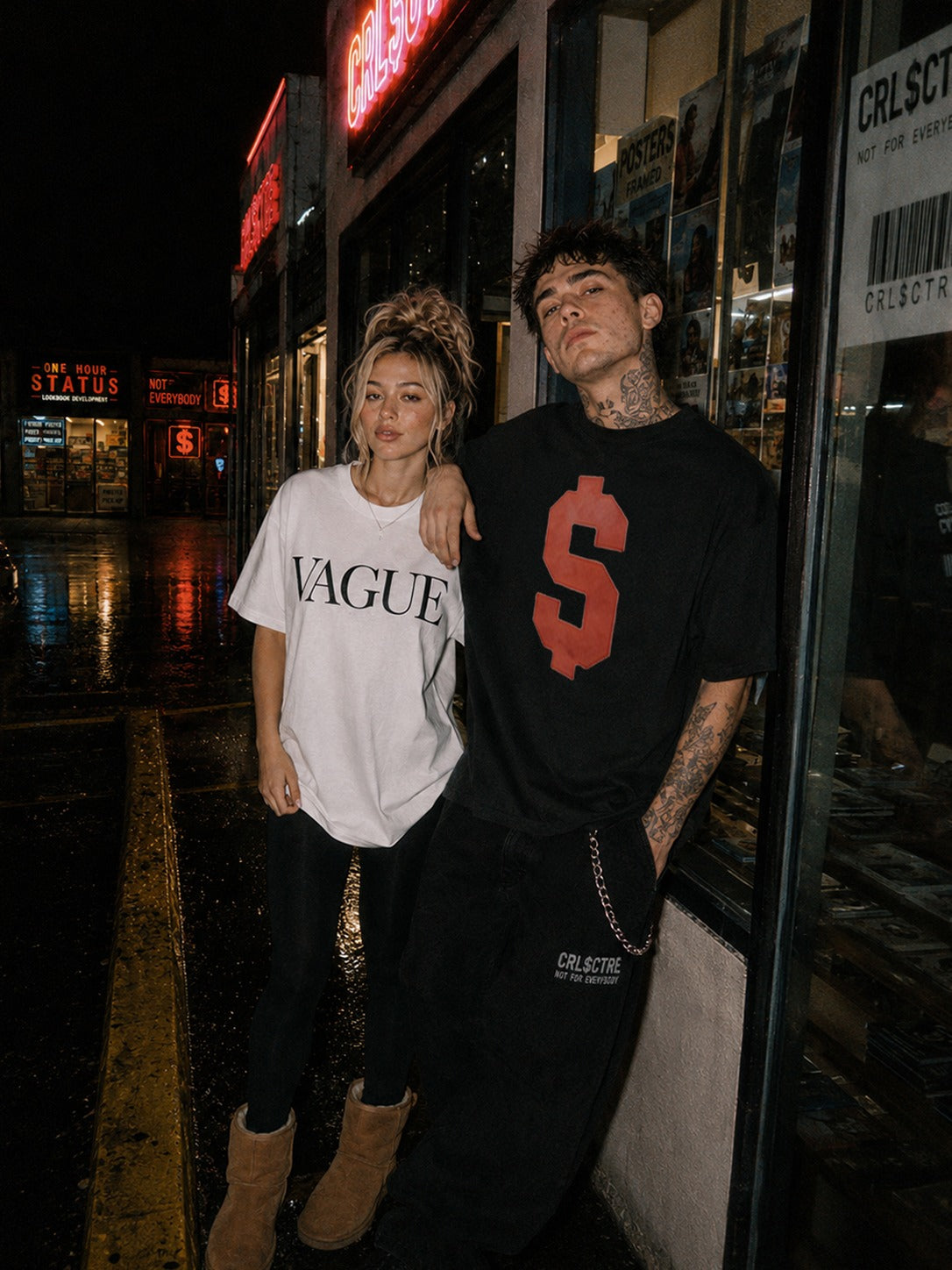 CRL$CTRE models wearing Vague and dollar sign shirts