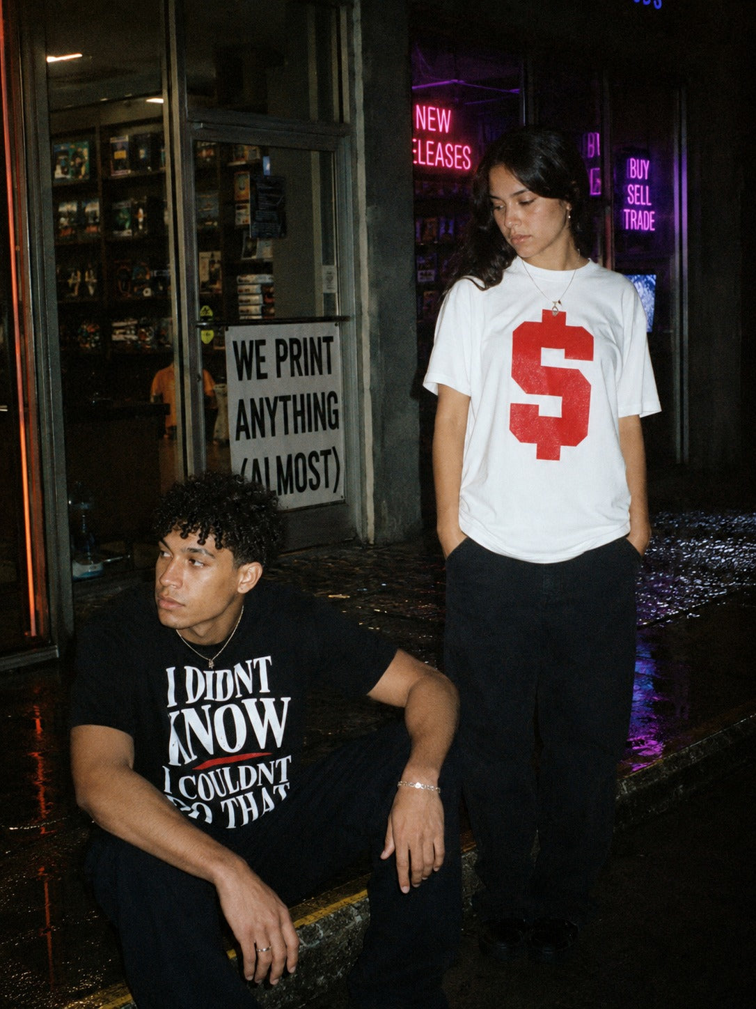 CRL$CTRE models outside the shop at night