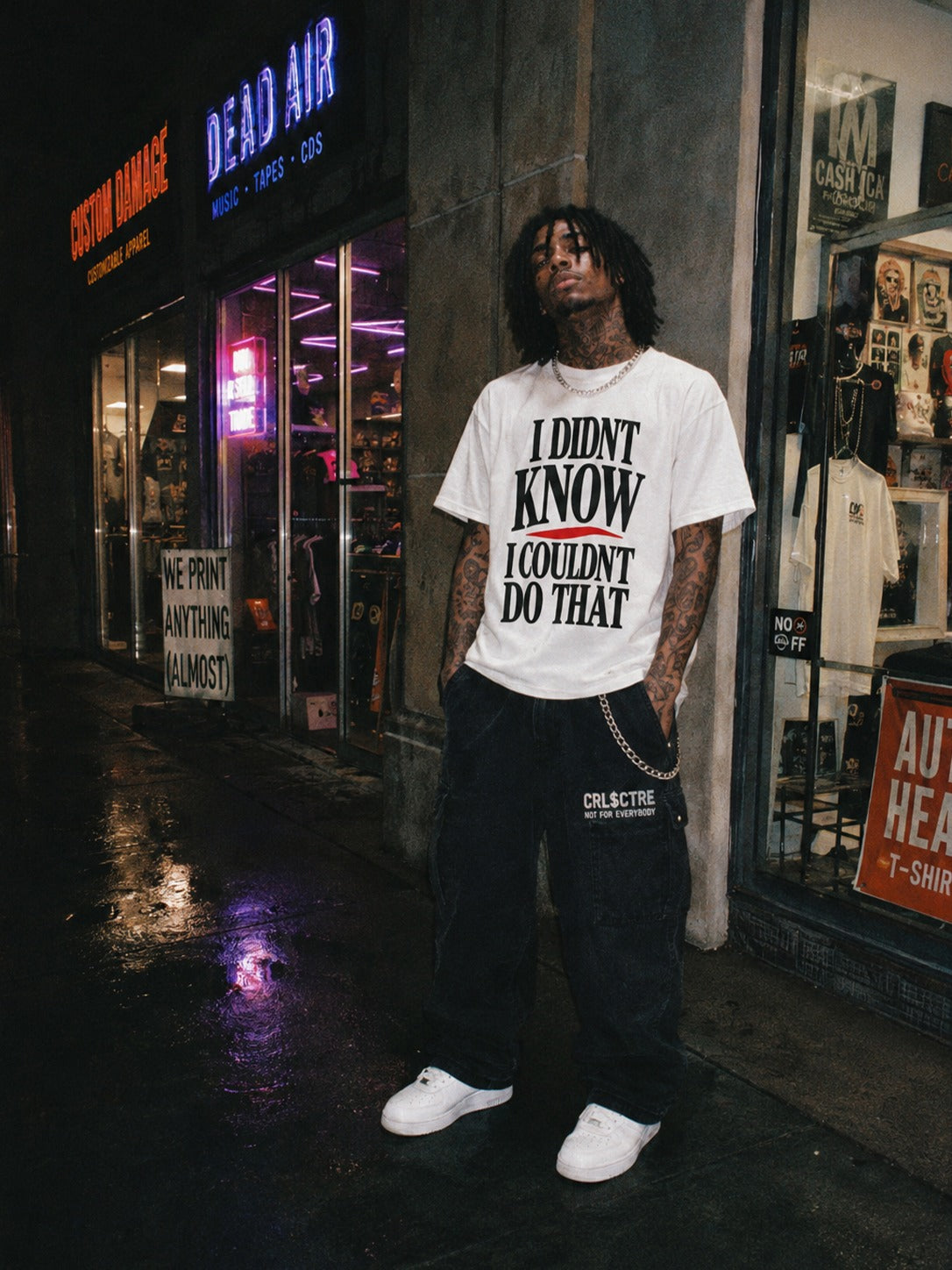 CRL$CTRE model in white graphic shirt
